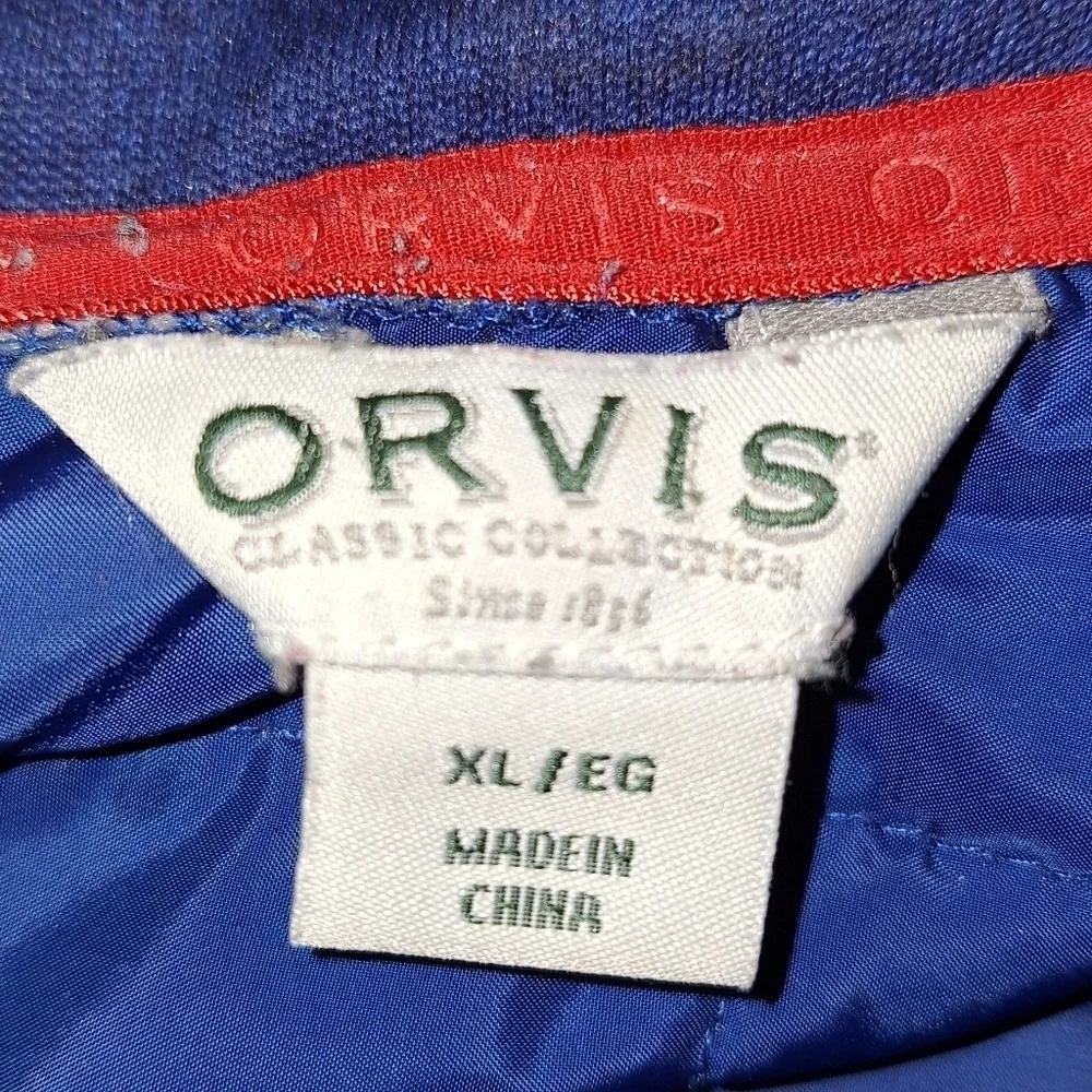 An Orvis blue quilted bodice jacket in a Men's size XL